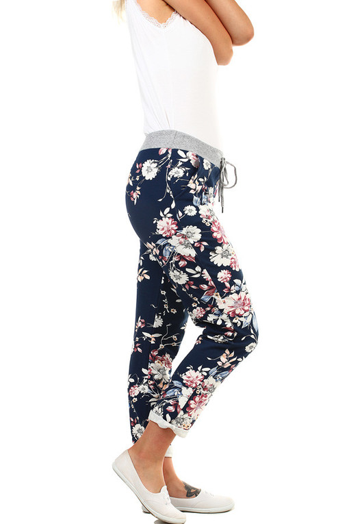 Damskie spodnie dresowe z kwiatowym nadrukiem