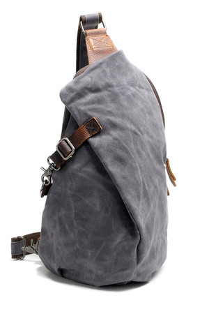 Jeden plecak na ramię z woskowanego płótna wodoodporny unisex zamykany na suwak i zatrzaski z podszewką i 1 wewnętrzną