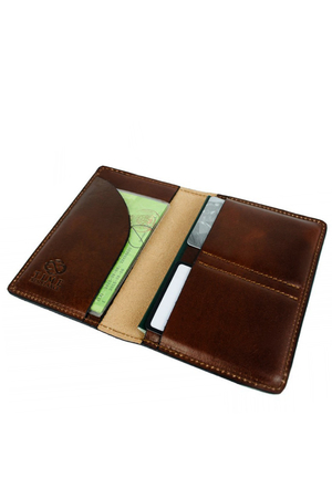 Skórzany portfel - etui na dokumenty o klasycznym wyglądzie i funkcjonalnym wzornictwie. Ponadczasowa monochromatyczność