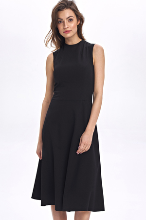 Zachwycająca minimalistyczna sukienka damska potwierdzająca powiedzenie ,,prostota jest piękna''. monochromatyczny design