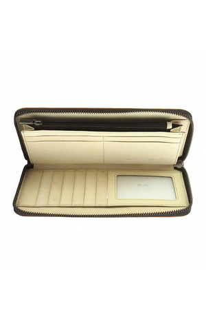Damski skórzany portfel w stylu vintage Cienka wnętrze szyte jasną skórą praktyczne jedenaście miejsc na karty kieszeń